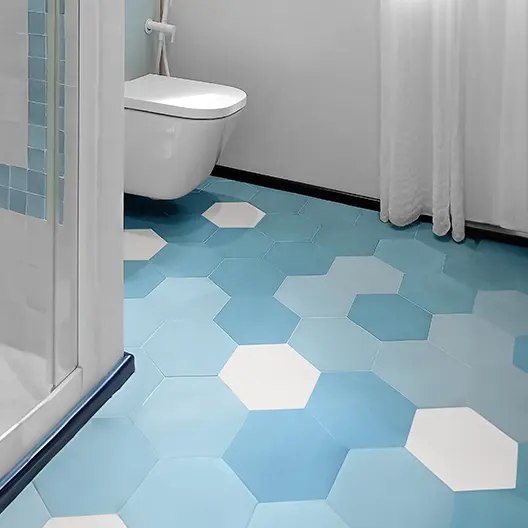 A blue cement tile bathroom with a contemporary design